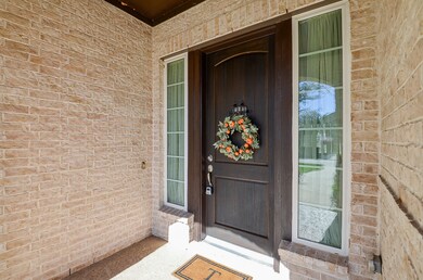 The grand covered entrance is complete with friend
