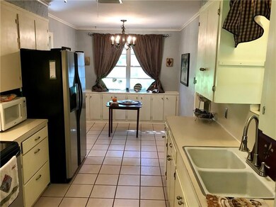 Kitchen Fridge remains without warranties, tons of