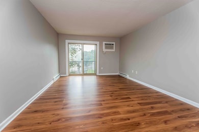 Living room with slider to balcony