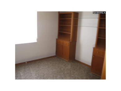 The back bedroom includes new carpet over hardwood
