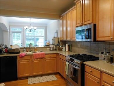 Kitchen featuring appliances with stainless steel 