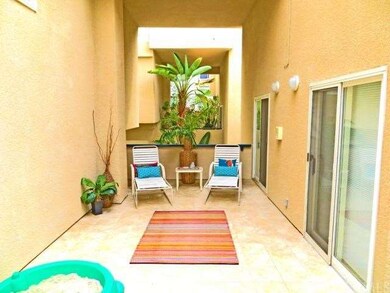 There are two decks and this private patio in the 