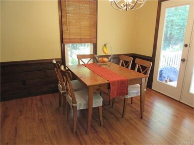 Eat-in Area offers Wood Laminate Flooring, Chair R