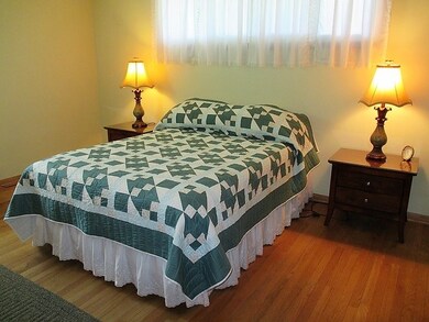 Master Bedroom with Hardwood Floors
