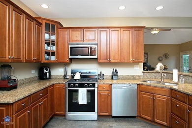 Stunning Kitchen with stainless steel appliances, new floating flooring
