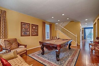 Gleaming wood floors from the front door to the ba