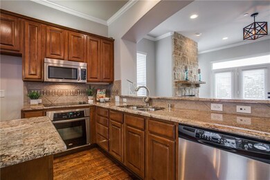 Check out this expansive kitchen with stainless st