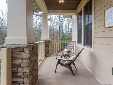 Comfortable front porch.  Watch the kids play.