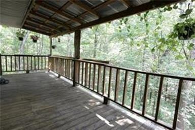 Large Deck off the rear overlooking creek.  A natu