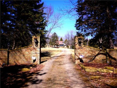 Exterior Front. Glorious Entry Gates to the Proper