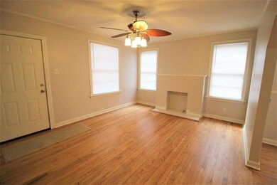 LIVING ROOM: Lots of windows for tons of natural l