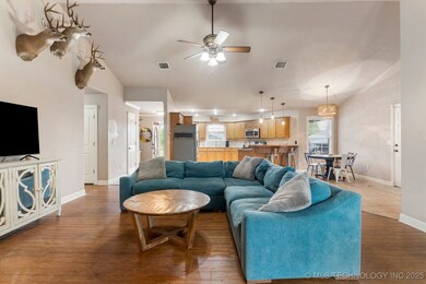 Open to kitchen and eat in dining