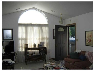 Living Room. Vaulted ceiling highlighted bt the la