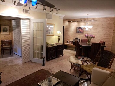 French Doors lead to bedroom
