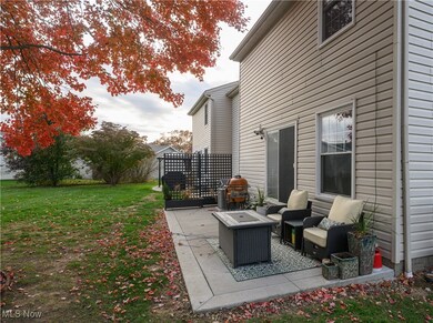 View of patio featuring outdoor lounge area and a grill