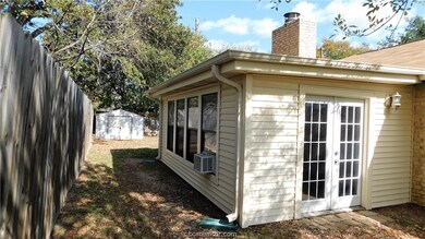 Bonus enclosed sun room with patio double doors.