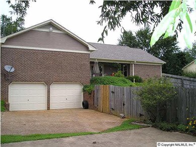 Rear showing 2 car basement garage