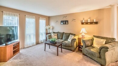 Main level living room windows brings abundance of
