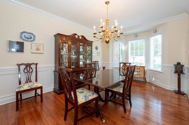 A elegant formal Dining area complimented by Hardw