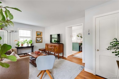 View of hardwood floored living room