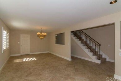 Formal dining room with the door to the kitchen an