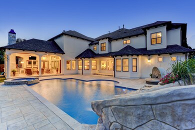 The beautiful backyard oasis is the focal point from nearly every room.