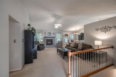 Walk right in to open living space and vaulted cei