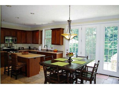 Kitchen. This eat-n-kitchen leads to a rear patio 