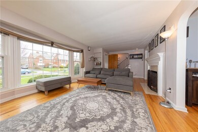 The spacious light-filled Living Room with bay win