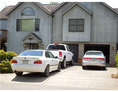 Exterior Front. Beautiful Riverfront Property