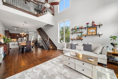 Large open concept living room and kitchen, with views towards the 3rd floor flex area.