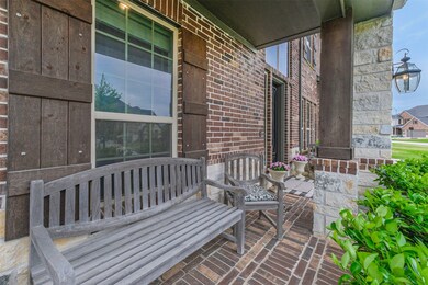 This is the kind of neighborhood where folks know one another by name, so this front patio may get its use!