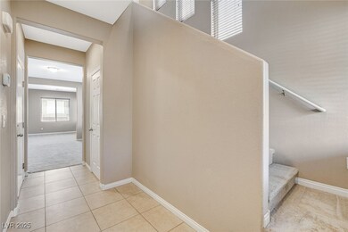 Stairs with baseboards, carpet flooring, and tile