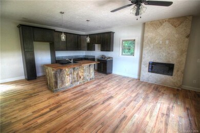 Kitchen & Living Room w/ Fireplace