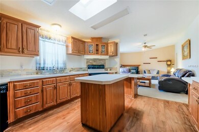 Open Floor Plan Allows View of Living Room while P