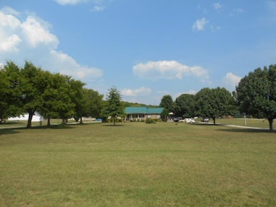 Main house (1422 Spring Place RD) and guest house 