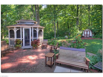 Gazebo has electric, cable, and screened windows.