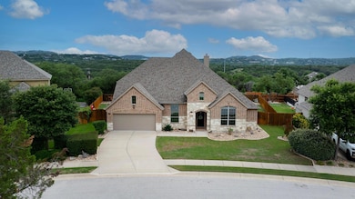 French country style house featuring stone siding