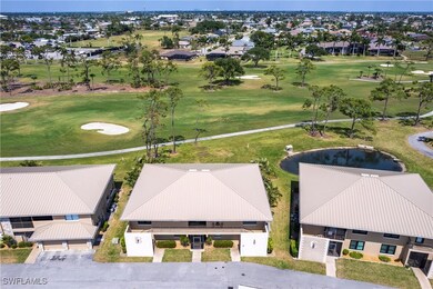 Condo to golf course & a little of garage roof
