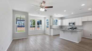 Kitchen with stainless steel appliances, a sink, 