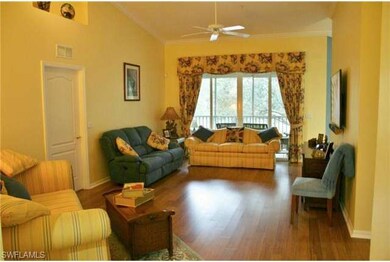 Living area view with Bamboo flooring and crown mo