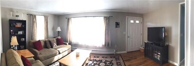 Panoramic View Of Living Room With...