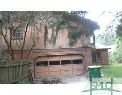 Exterior Front. Oversized double garage with large