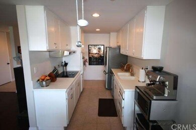 Remodeled kitchen with Corian countertops and an a