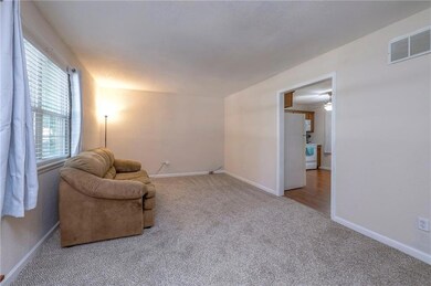 405 S Jefferson St, Raymore, MO 64083 - photo 5