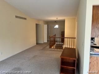 Spare room featuring carpet floors