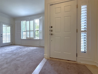 Welcome home! Natural light flows into the entry a