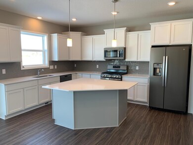An awe-inspiring kitchen with a beautiful styled island is the perfect place for friends and family to gather around for years to come.