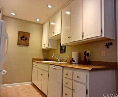 Upgraded Counters, Tile Floors, Updated Cabinets a