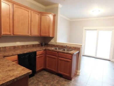 Kitchen open to Dining Area with Patio Doors with 